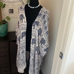 FREE. elephant print cover. blue and white.